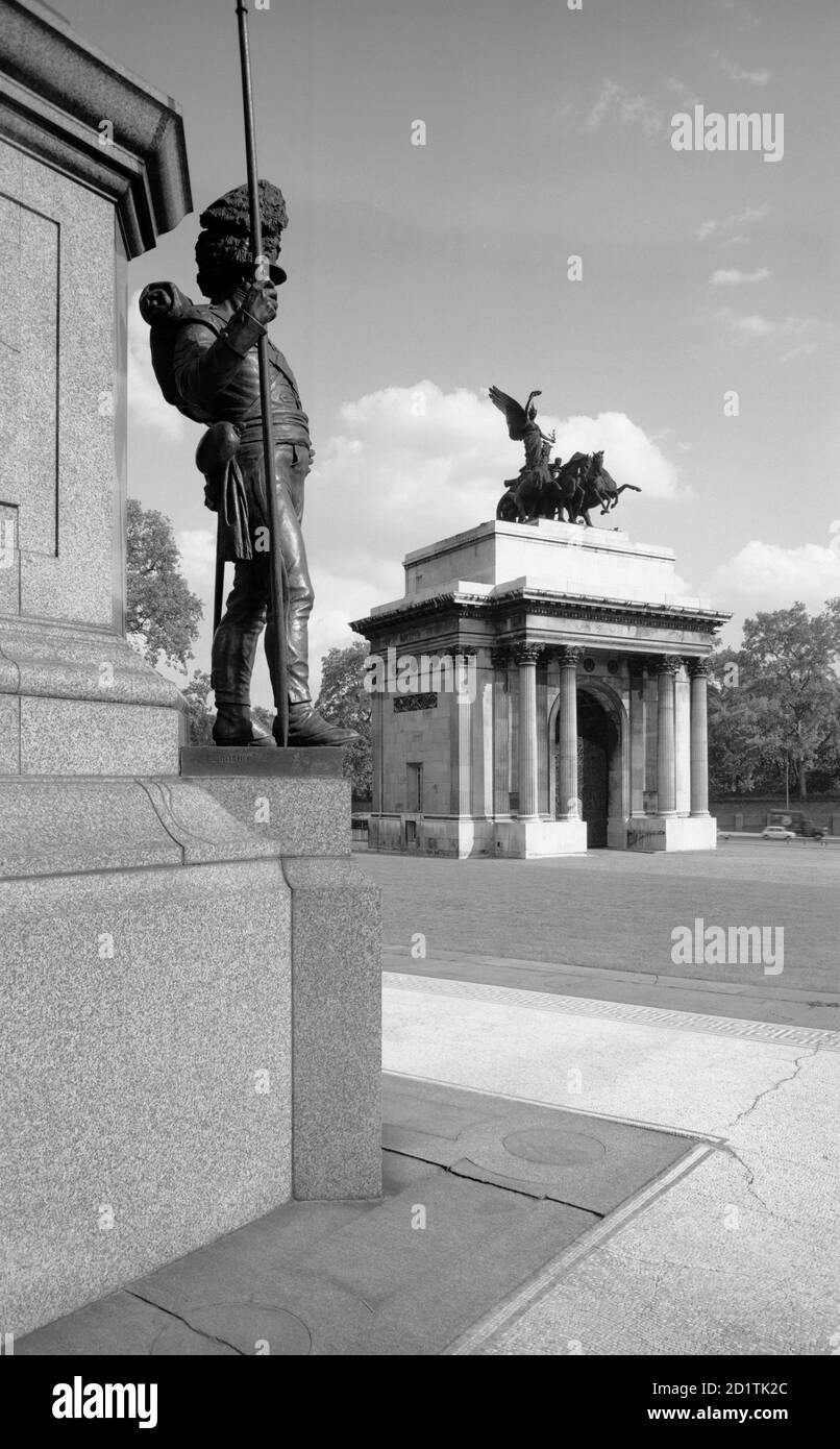 WELLINGTON ARCH, Westminster, London. General view of Wellington Arch (also known as Constitution Arch or the Green Park Arch) from the Wellington Statue. The arch has been in its present position since 1883, when it was removed from the old site, about 200 feet away. Photographed by Eric de Mare. Date range: 1945-1980. Stock Photo