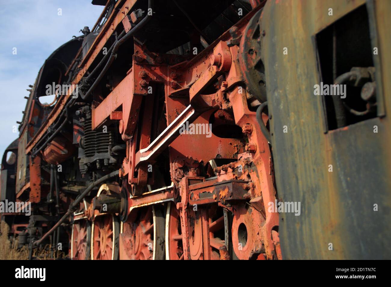 Steam locomotive. Old rusty railway machine. Retro coal industry. Stock Photo