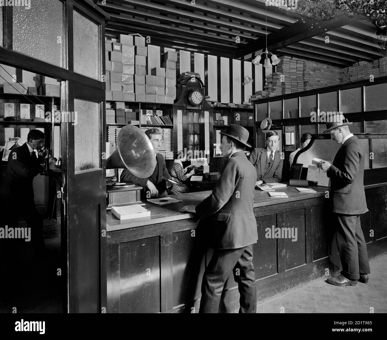 MARCONI HOUSE, Strand, London. Interior view. The sales office of Wireless World, with staff and customers. Wireless World first went to press in 1913 as an expanded replacement publication for The Marconigraph. Photographed by Bedford Lemere & Co in 1916. Stock Photo