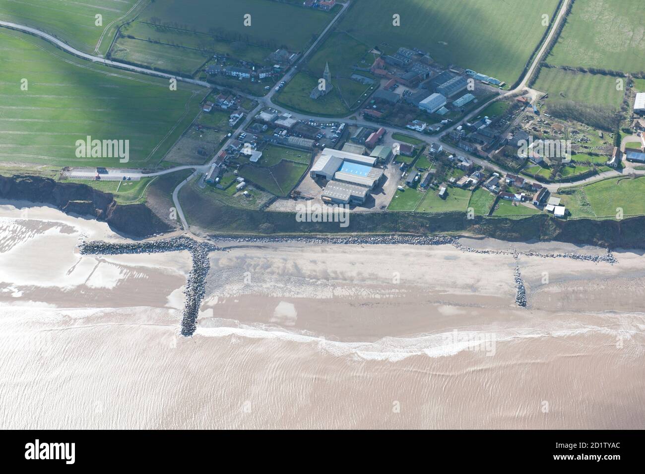 Mappleton Village and Sea Defences constructed in 1991 as protection from erosion, Mappleton, East Riding of Yorkshire, 2014, UK. Aerial view. Stock Photo