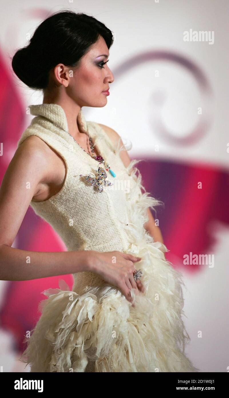 A Malaysian Model Displays Jewellery From Dewcarat Ltd And A Collection From Textile And Fashion Design Students Of Malaysian Institute Of Art During Jewelry In Fashion In Conjunction With The 11th Malaysia