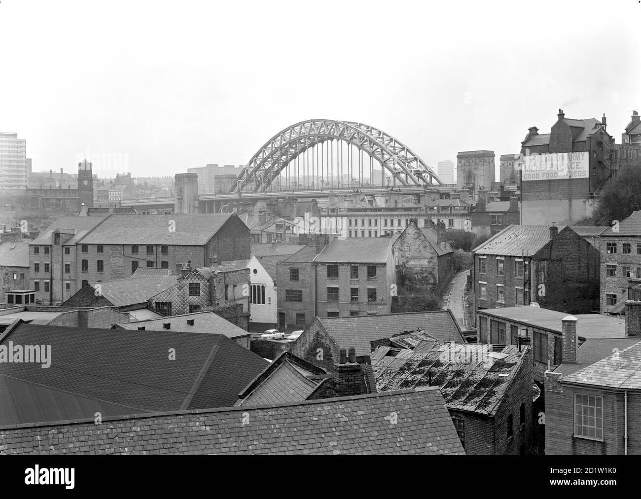 A view looking south-west over rooftops from Pandon Bank towards the new Tyne Bridge, Gateshead, Tyne and Wear, UK. Stock Photo