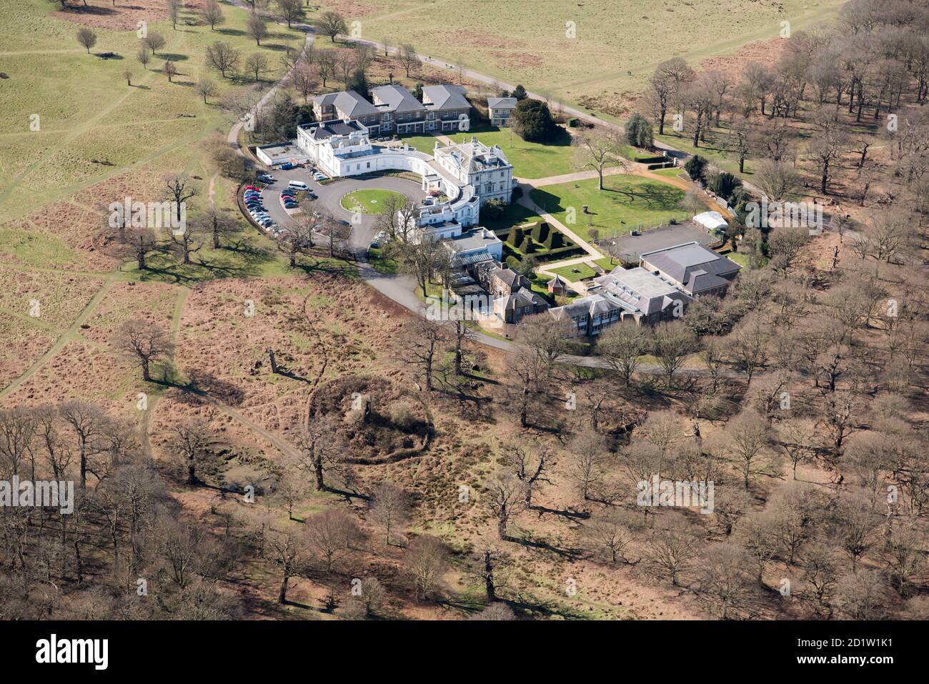 White Lodge, home of the Royal Ballet School and former hunting lodge with grounds designed by Humphry Repton c.1805, Richmond Park, London, UK. Aerial view. Stock Photo