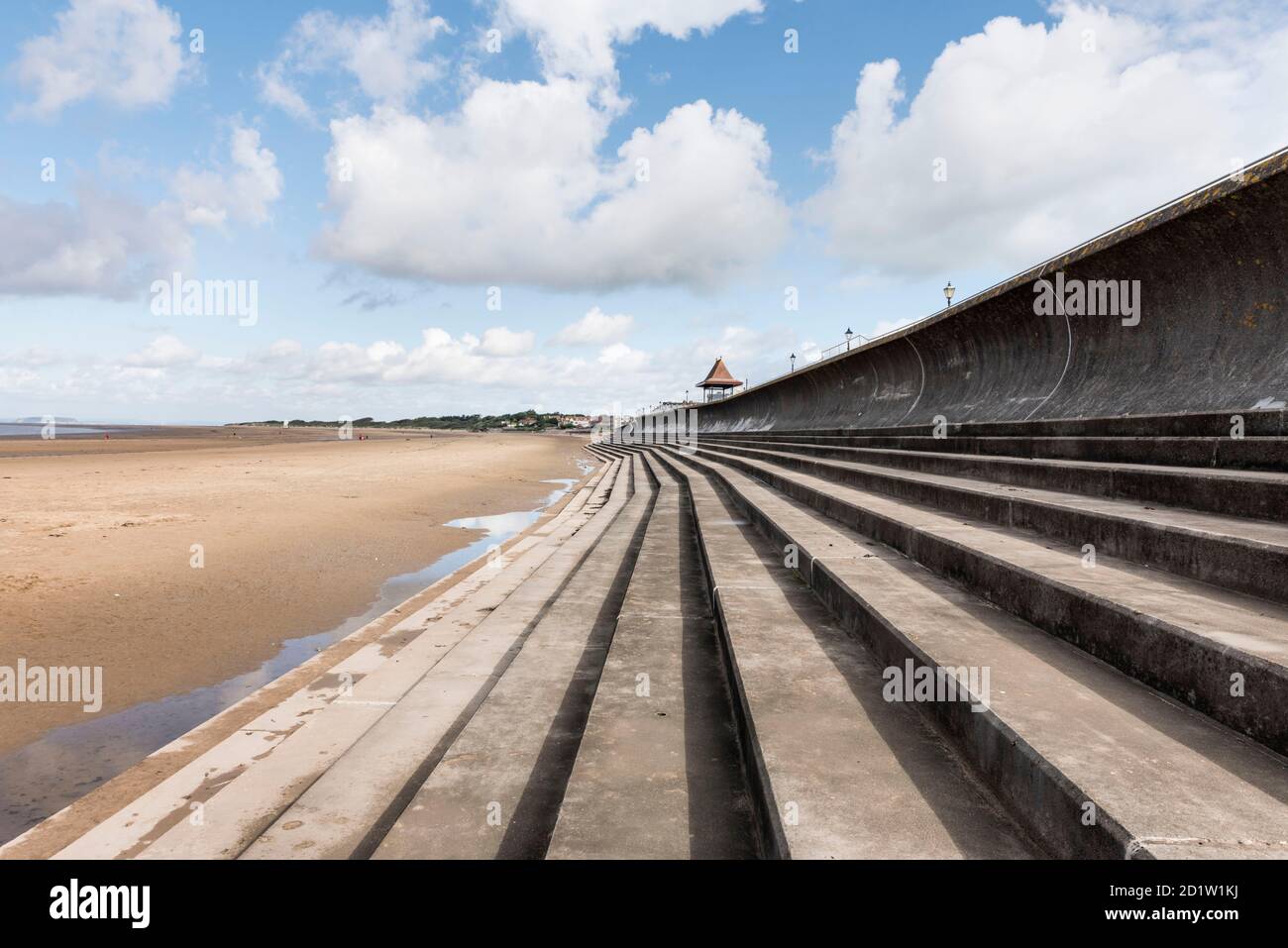 General view looking north along the sea defences adjacent to the Esplanade, showing the sea wall and steps, Sedgemoor, Somerset, UK. Stock Photo