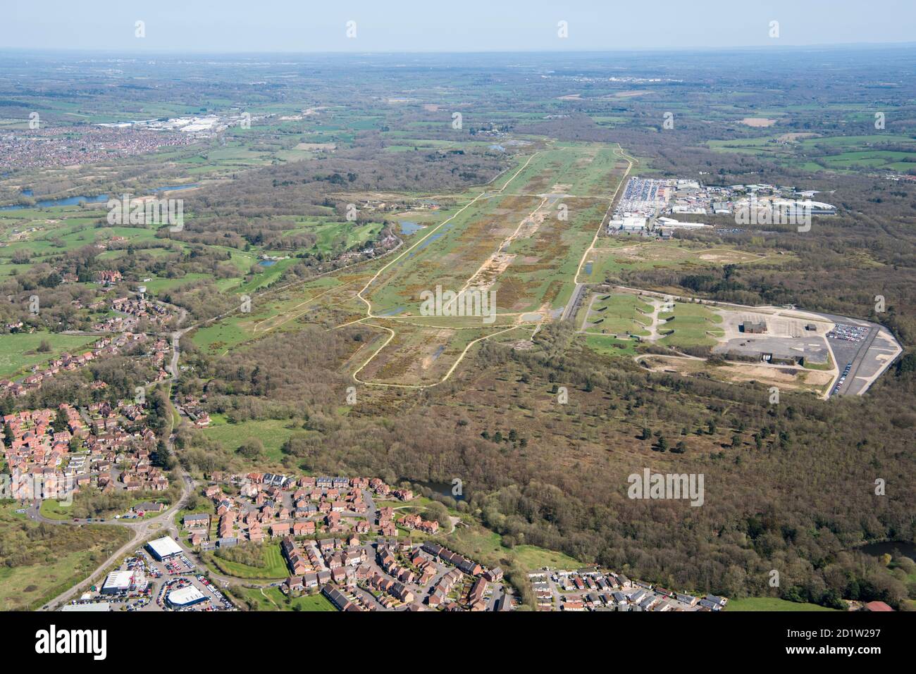 The former Greenham Common Airbase, from the south-west, Newbury, West Berkshire, UK. Aerial view. Stock Photo