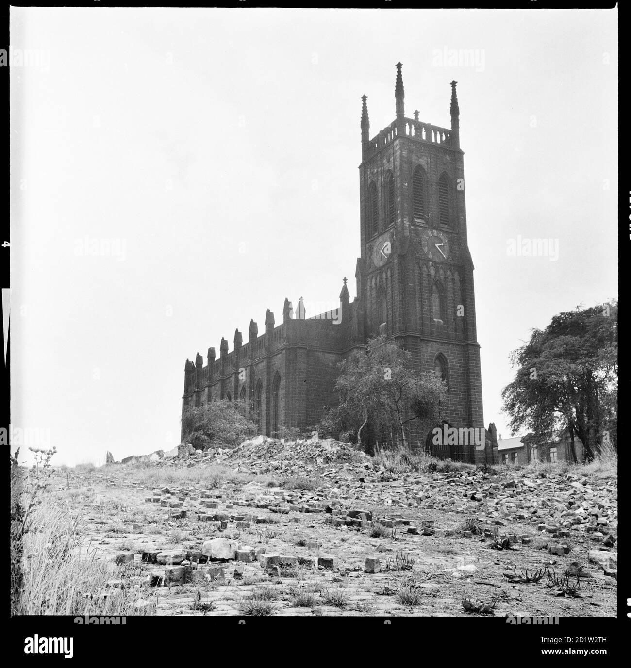 St Mary's Church seen from the north west, amidst the rubble from the demolition houses in New Church Place, Leeds, West Yorkshire, UK. Stock Photo