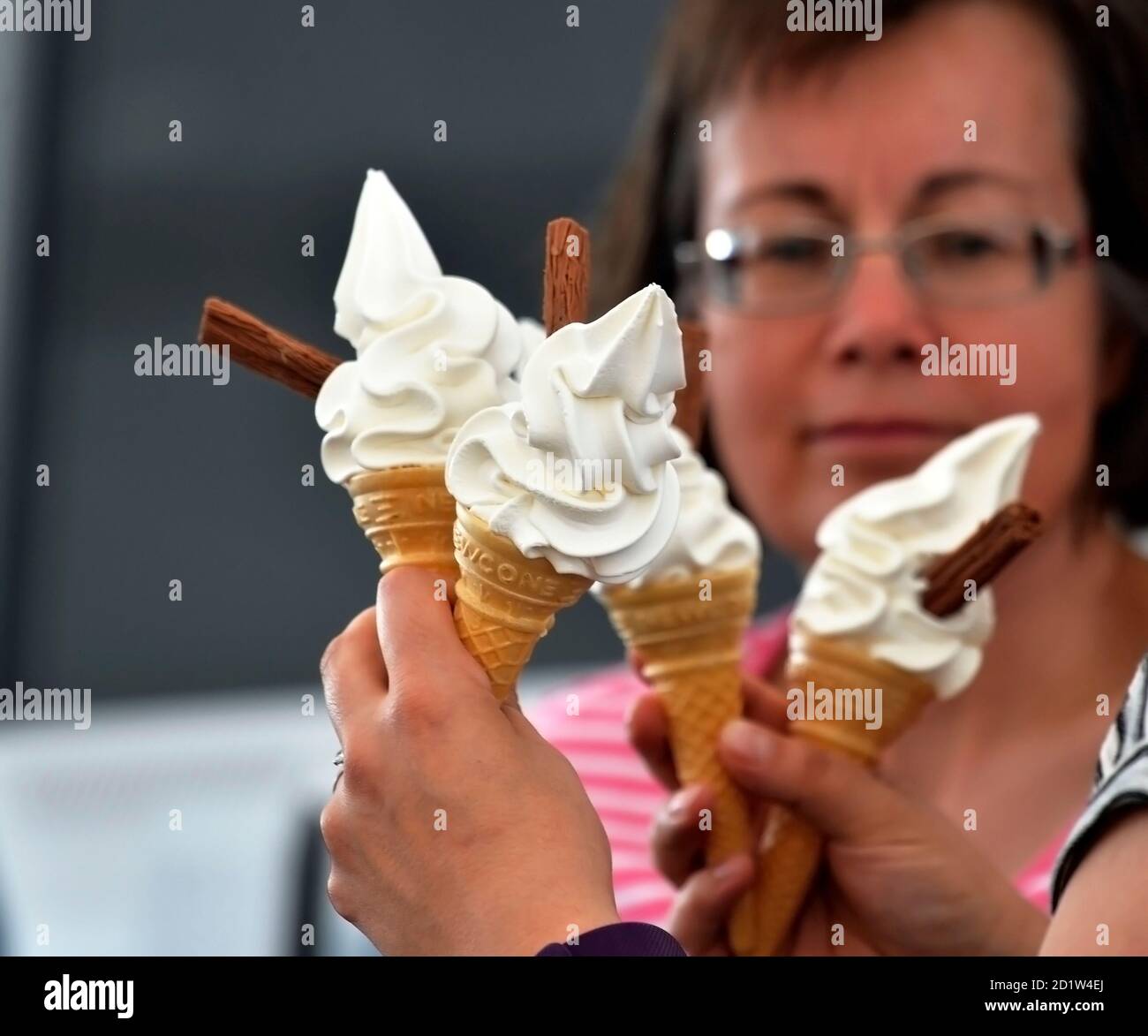 Ice creams cornet's Hot summer treat '99' Stock Photo