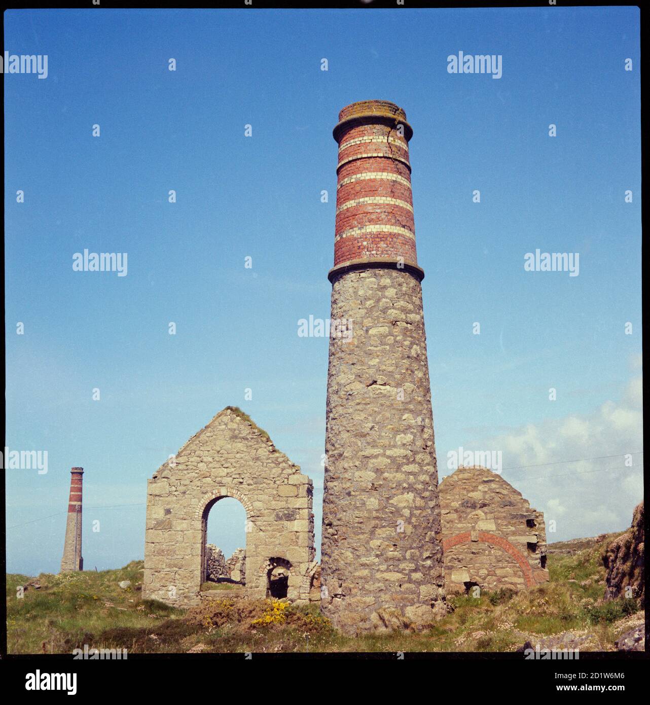 Chimney and engine house remains at Levant Mine, Levant Road, Trewellard, St. Just, Cornwall, UK. Stock Photo