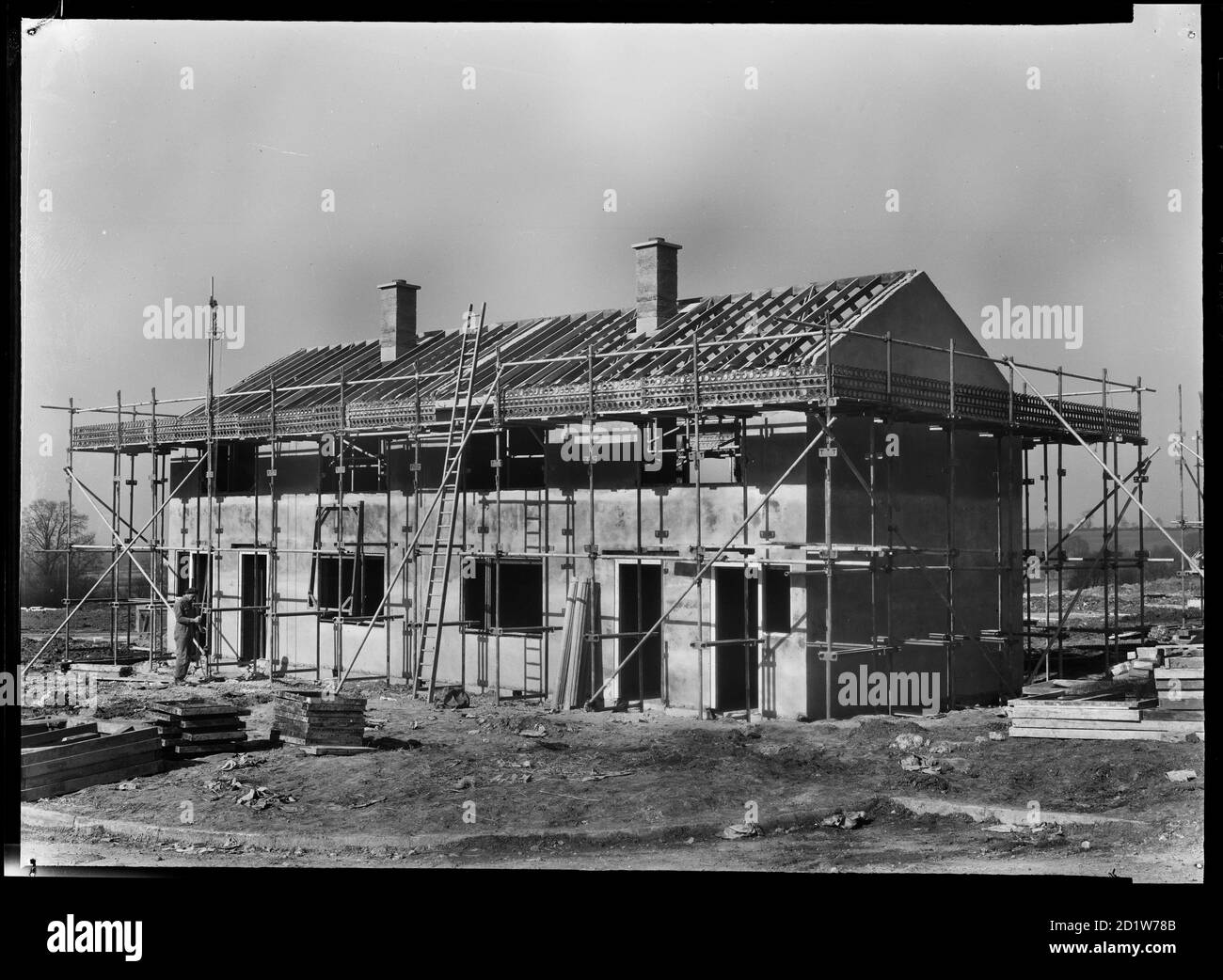 A pair of semi-detached Easiform houses under construction on the Penhill Estate, Penhill, Swindon, Wiltshire, UK. Stock Photo