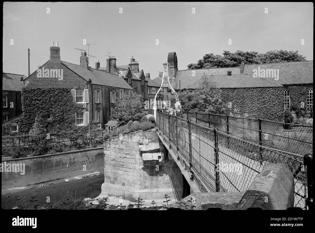 The Old Bridge and Footbridge, Chantry Place, Morpeth, Northumberland, UK. Stock Photo