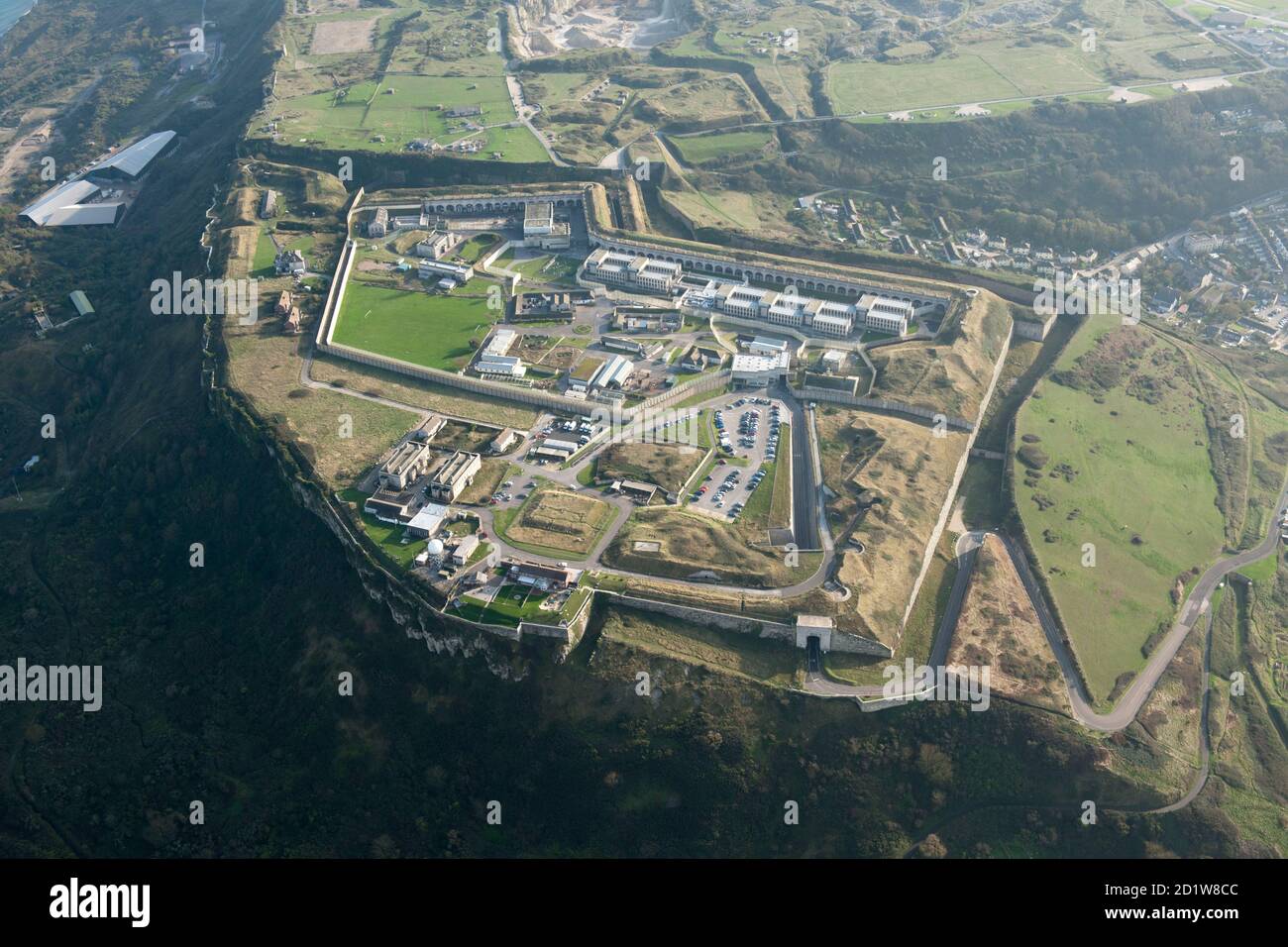 The Verne Citadel, coastal battery constructed between 1857-1881 and then prison (HMP Verne) which was an Immigration Removal Centre between 2013-17, Portland, Dorset. Aerial view. Stock Photo