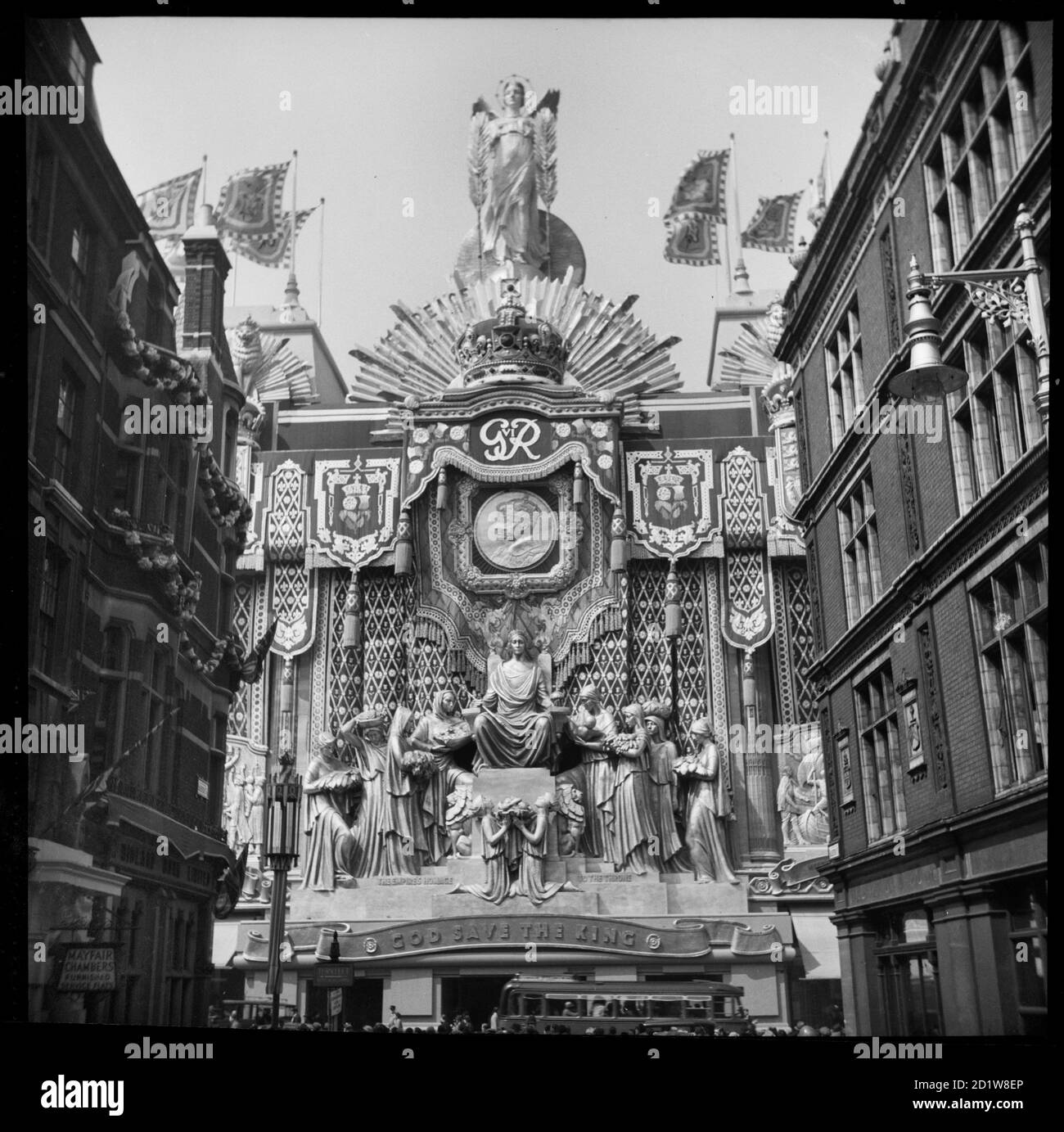Exterior view of Selfridges decorated to mark the coronation of King George VI, viewed from Balderton Street, 1937. Stock Photo