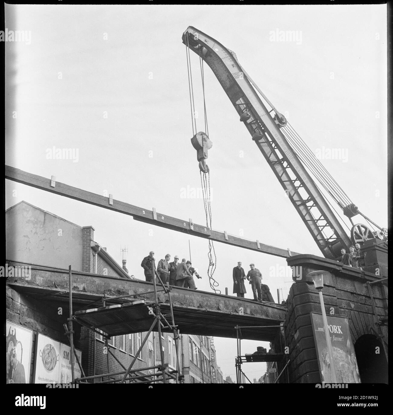 View looking towards Caroline Street from Times Square showing repair work being carried out on the bridge carrying the North Staffordshire Railway over the road. Stock Photo