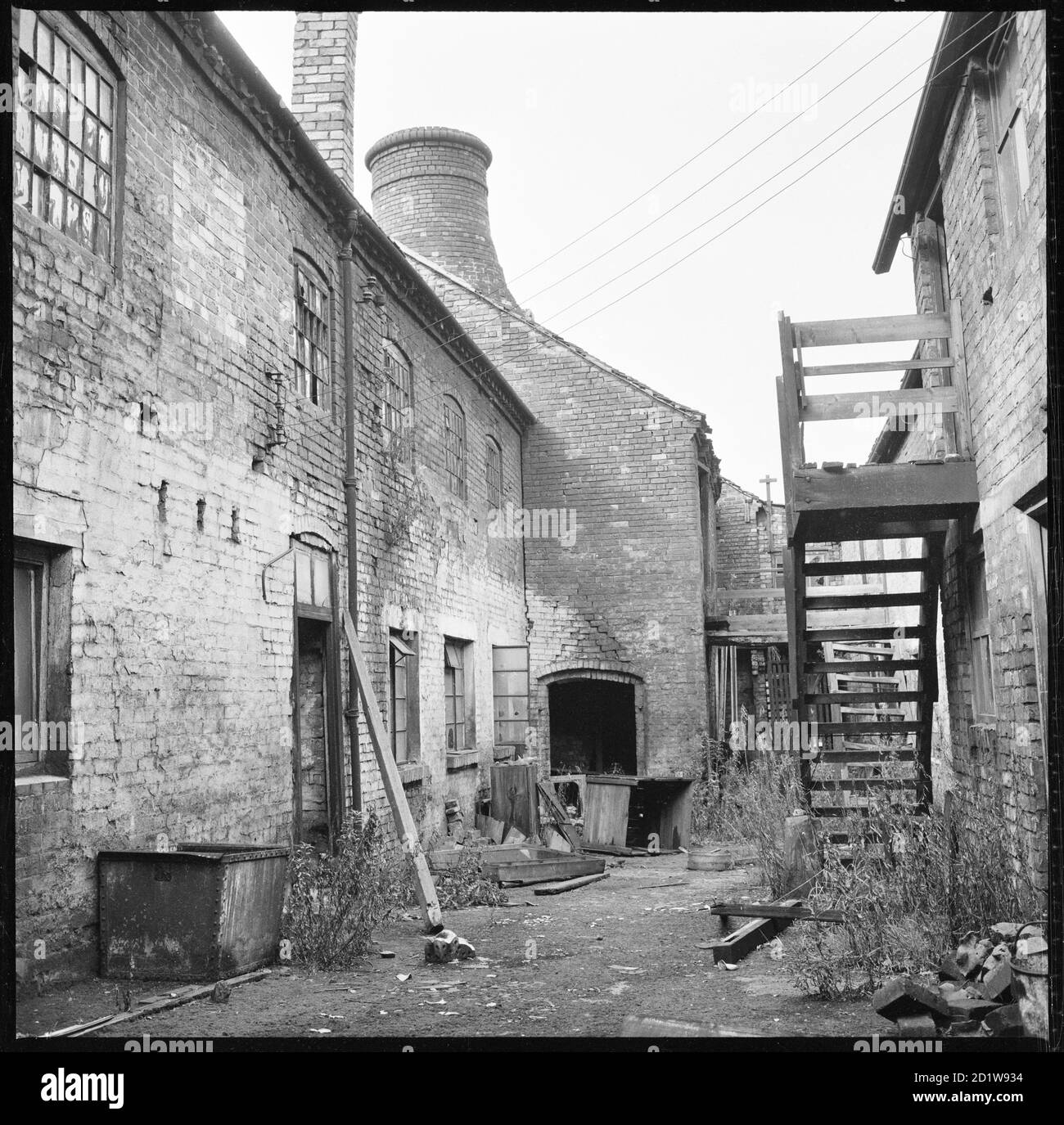 The courtyard at the rear of the Anchor Works showing the buildings in a dilapidated condition. Stock Photo