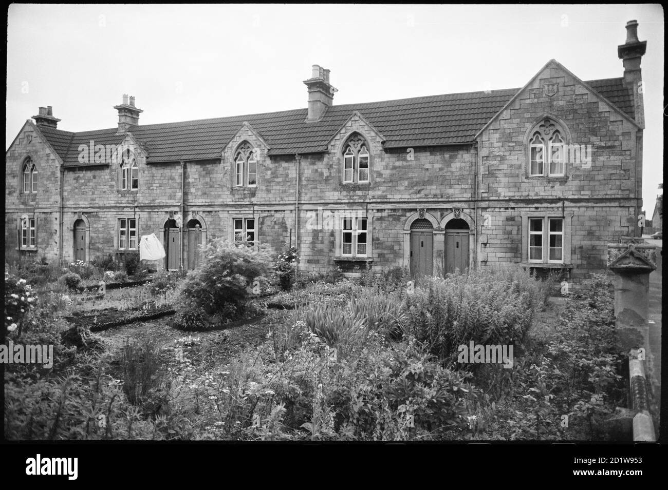 Exterior view of the almshouses, a terrace of five cottages built by philanthropist Rachel Fowler in 1862. Stock Photo