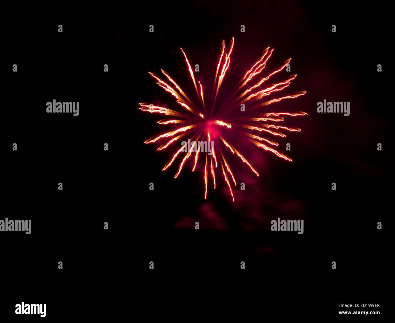 Burning sparklers on black background. Small fireworks giving off sparks of fire. Sparks explosion. During Armada exhibition in France Stock Photo