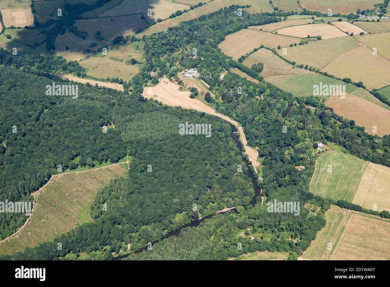 Milton Abbot, Devon. Landscape park and wood designed by Humphry Repton at Endsleigh House, now a hotel, near Milton Abbot, Devon. Aerial view. Stock Photo
