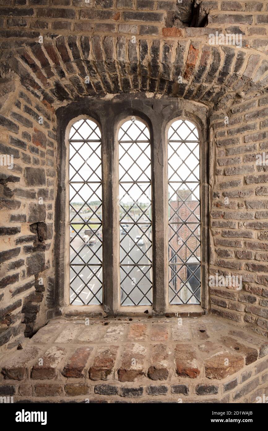 South Gate, London Road, King's Lynn, Norfolk. Detail of the south-west window on the second-floor of the gatehouse, from the north. Stock Photo