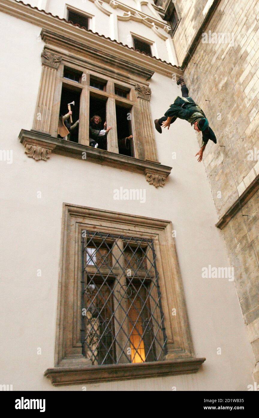 Historic enthusiasts perform a re-enactment of Prague's First Defenestration, an act of throwing out someone from a window, in Prague July 31, 2009. The historical event of Defenestration began on July 30,