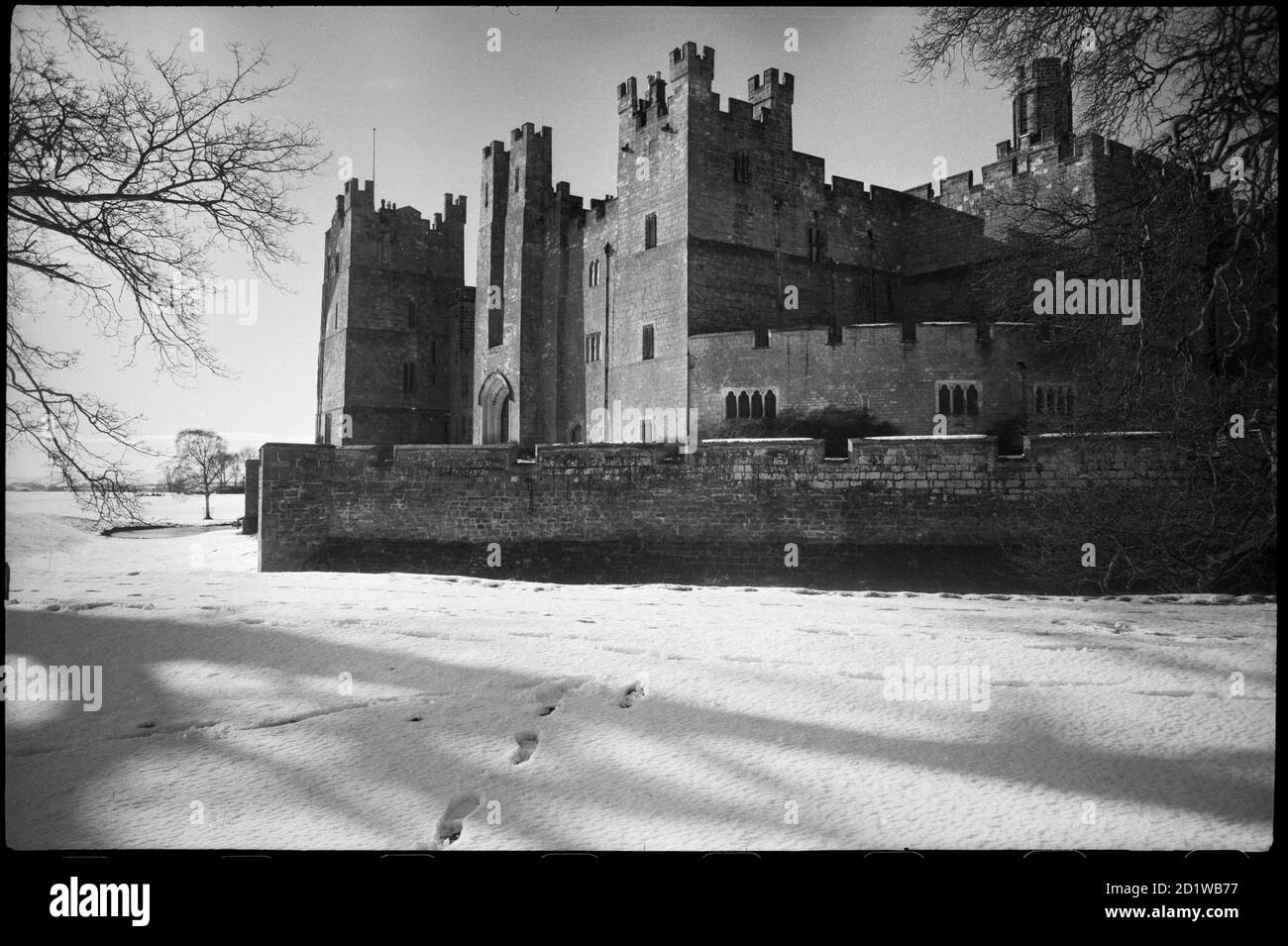 Raby Castle, Raby With Keverstone, Raby With Keverstone, County Durham. An exterior view of Raby Castle, showing the east elevation from the south-east, with a low curtain wall in the foreground. Stock Photo