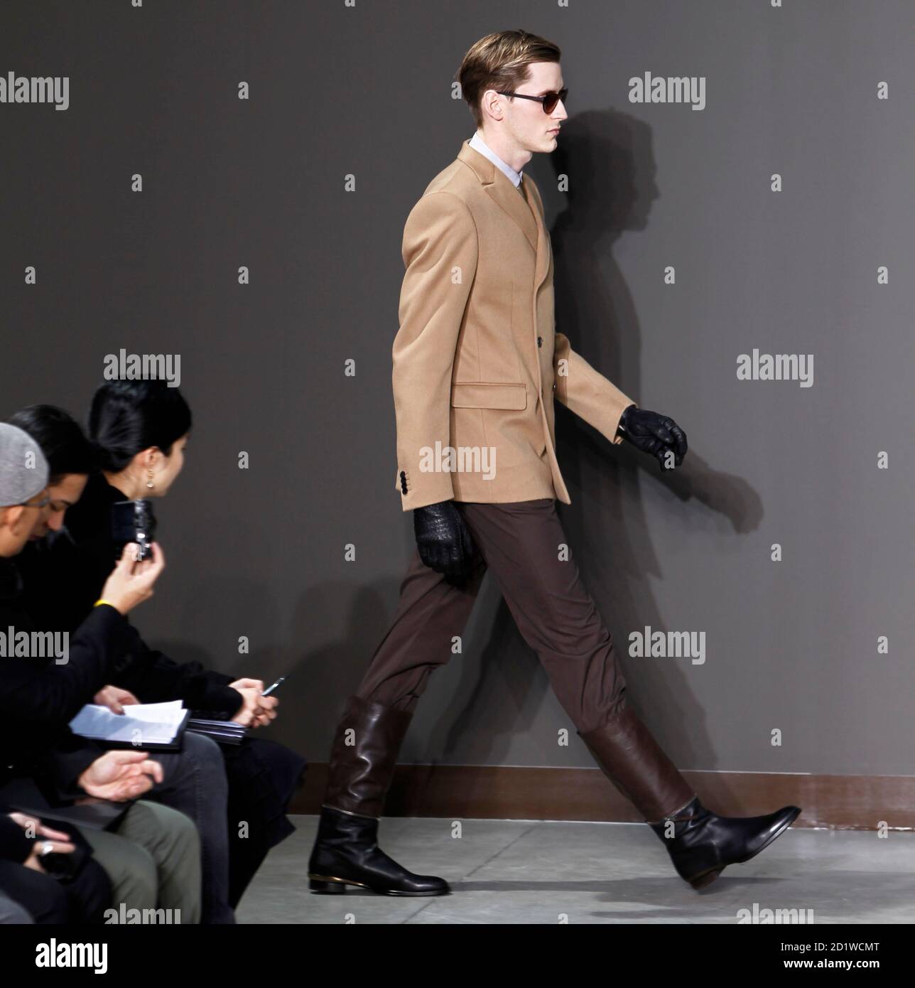 A model presents a creation by designers Marc Jacobs and Paul Helbers for  French fashion house Louis Vuitton as part of their Fall-Winter 2010/2011  men's ready-to-wear fashion show in Paris January 21,