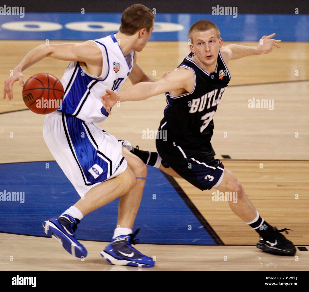 Butler's Zach Hahn (R) steals the ball from Duke's Jon Scheyer in the first half of their NCAA national championship college basketball game in Indianapolis, Indiana, April 5, 2010.     REUTERS/Brent Smith (UNITED STATES - Tags: SPORT BASKETBALL) Stock Photo