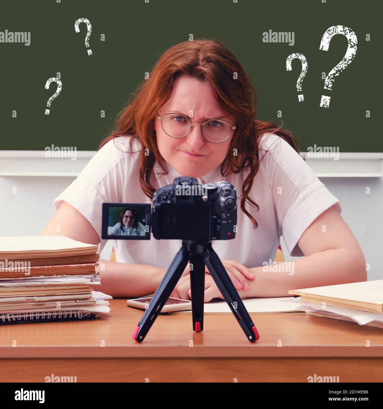 A school teacher is at a loss in the classroom for an online lesson