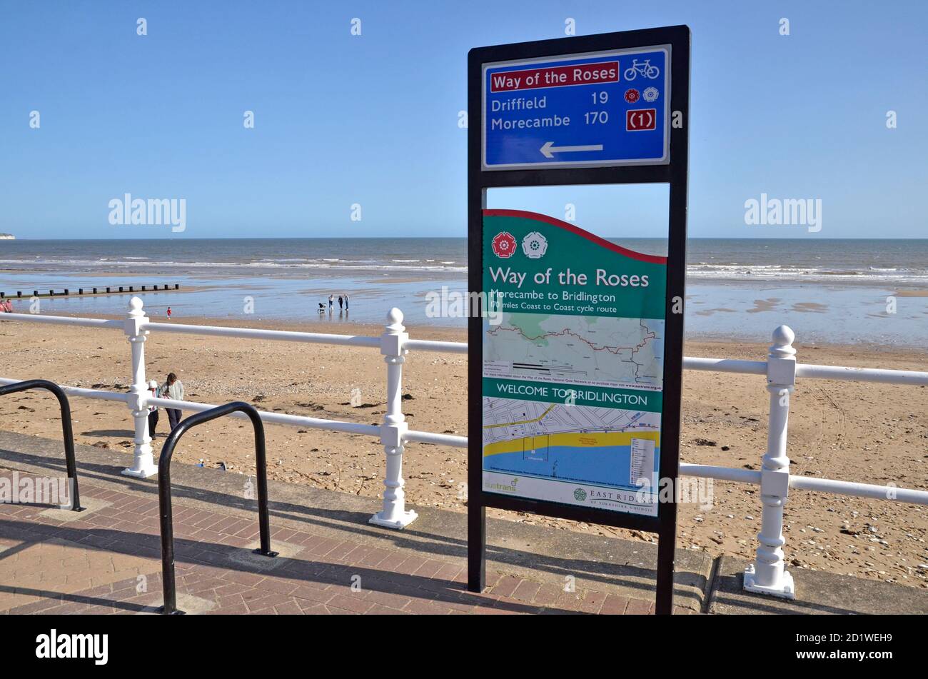 A signpost for the Way of The Roses Cycle Route between Driffield and Morecambe, in Bridlington, Yorkshire Stock Photo