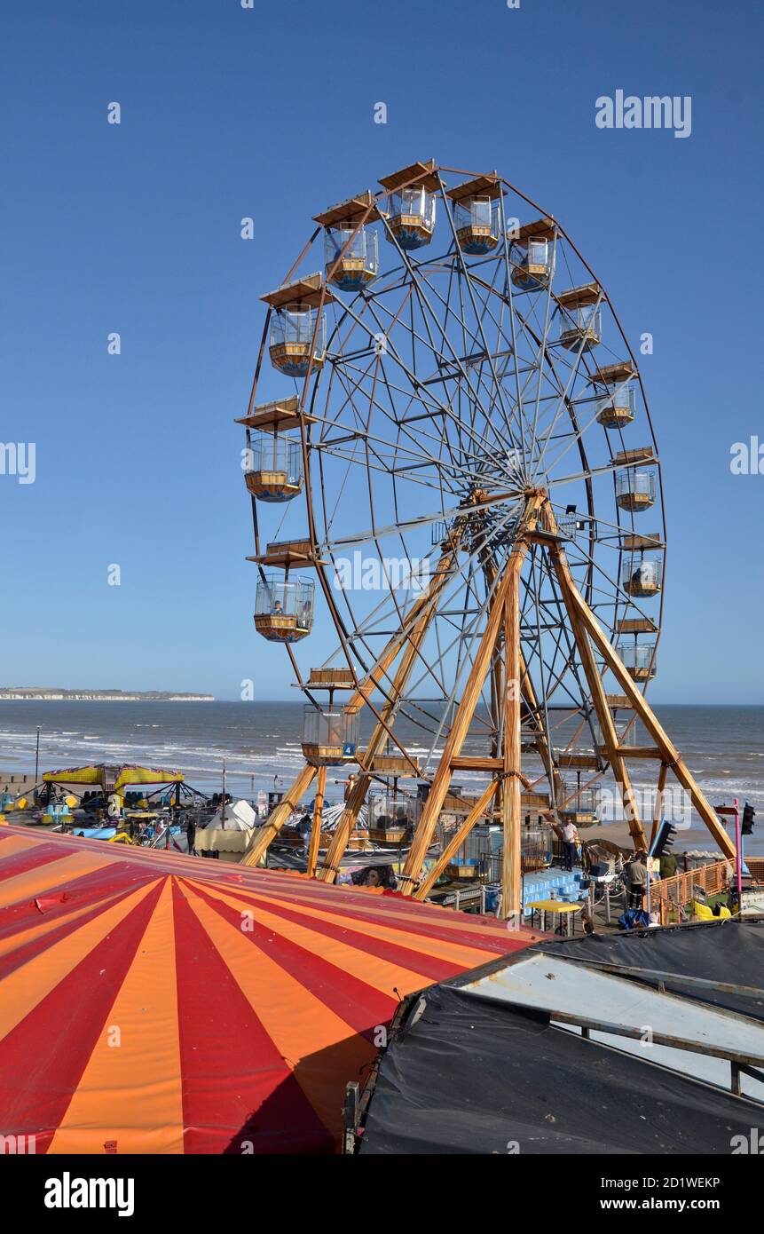 A Ferris Wheel on the seafront funfair at Bridlington in East Yorkshire Stock Photo