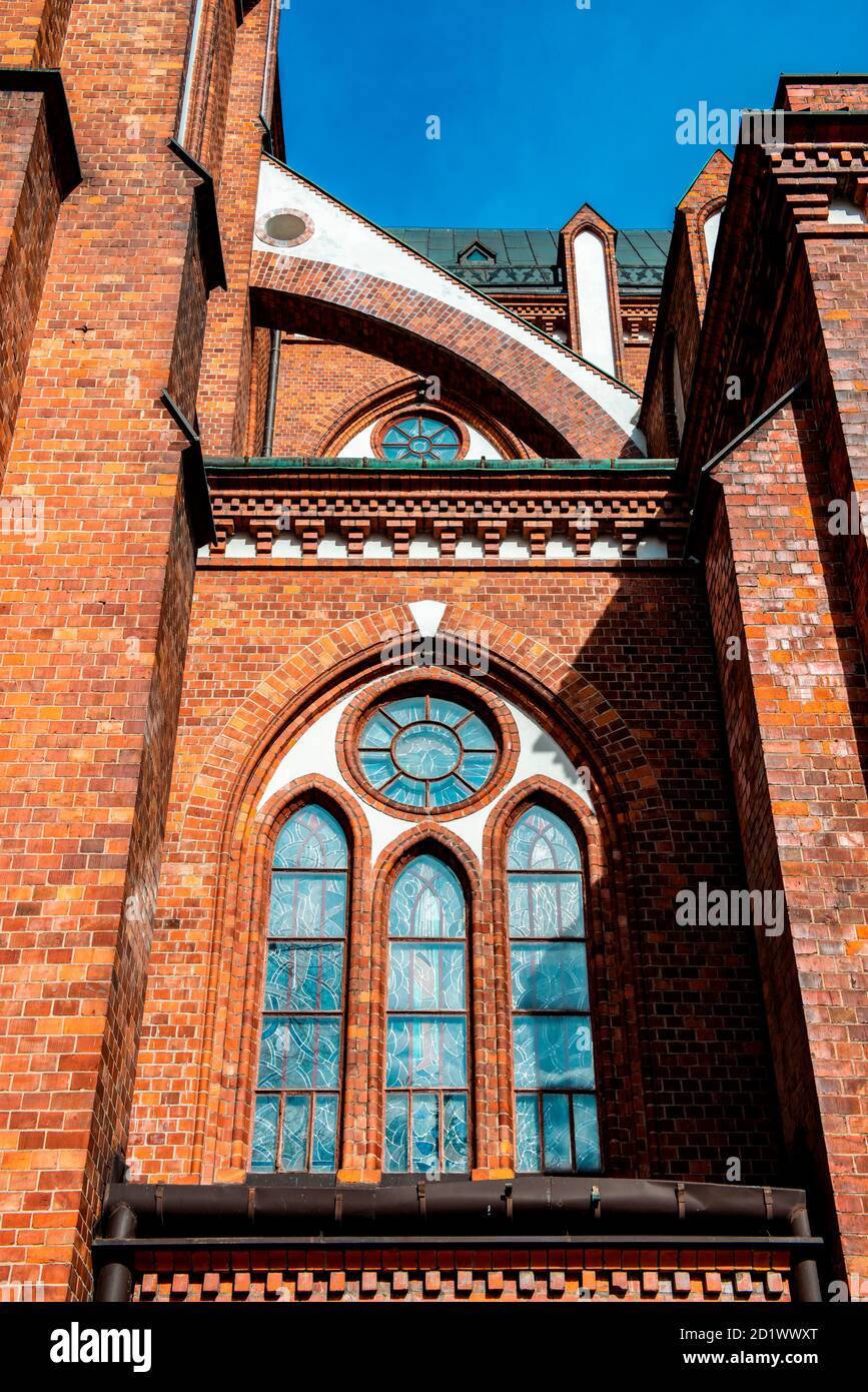 Detail of red brick facade of Cathedral of St. Michael the Archangel and St. Florian the Martyr in Warsaw, Poland, built in 1901. Stock Photo