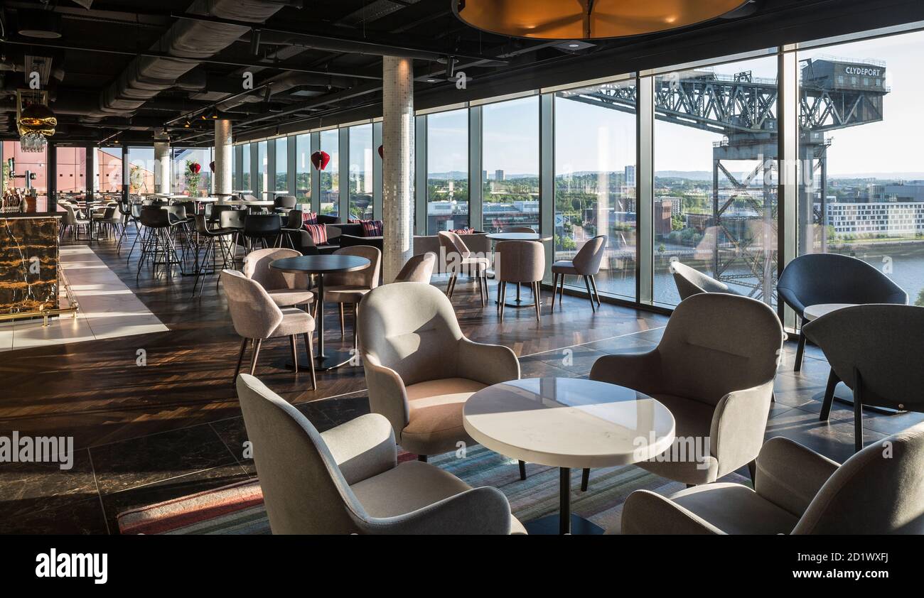 Interior view of the Red Sky Bar of the 174-room Radisson RED Hotel overlooking the river Clyde, Glasgow, Scotland, UK. Stock Photo