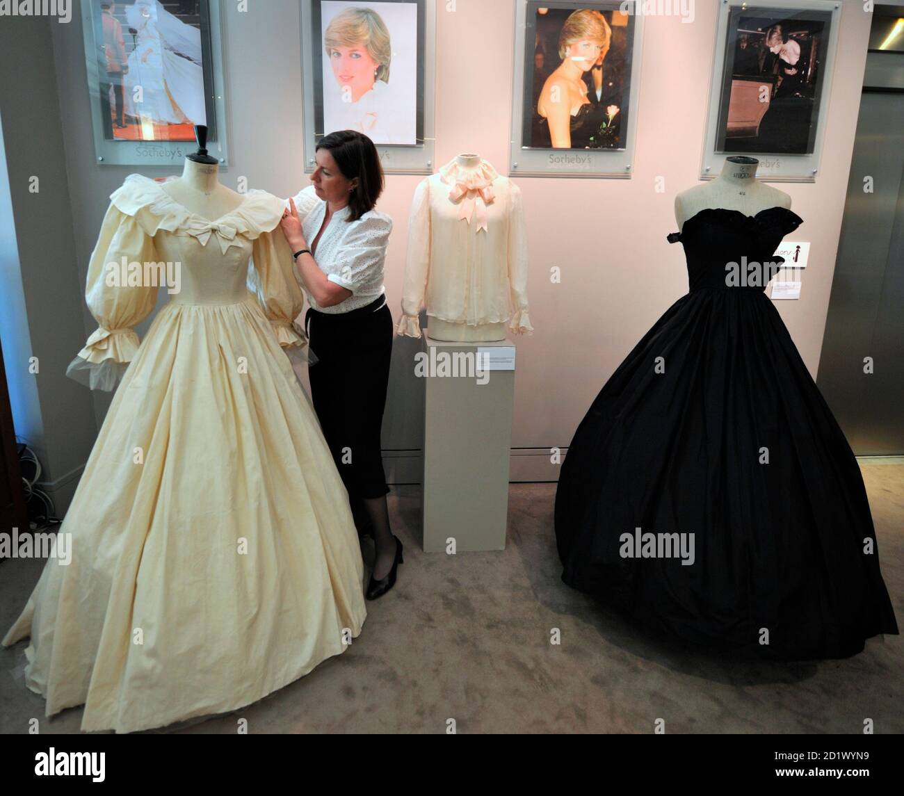 Princess Diana Wedding Dress High Resolution Stock Photography And Images Alamy Princess diana's wedding dress as seen on season 4 of the crown is one of the most iconic. https www alamy com auctioneer kerry taylor arranges the silk wedding dress calico prototype for princess diana which is displayed at sothebys auction house in paris may 17 2010 the collection taken from the royal archives of dressmakers david and elizabeth emanuel will be auctioned by kerry taylor auctions in london on june 8 2010 reutersphilippe wojazer france tags society profile royals image379813317 html