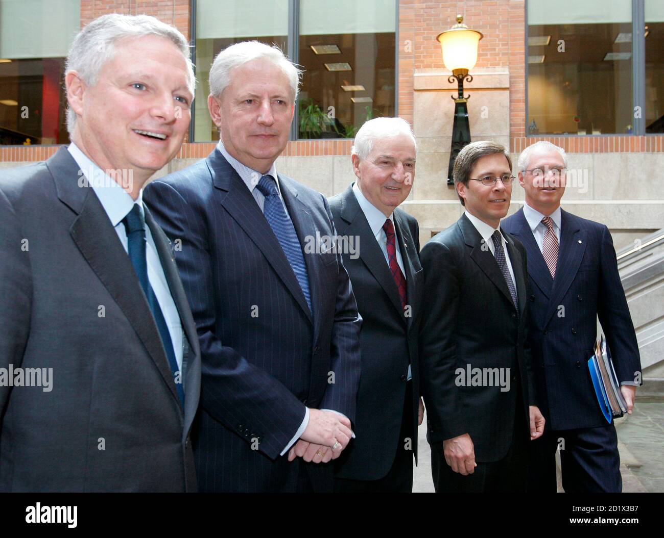 Power Corp Of Canada S Chairman Of The Executive Committee Paul Desmarais C And His Sons Paul Desmarais Jr L The Company S Chairman And Co Chief Executive Officer And Andre Desmarais R The Company S