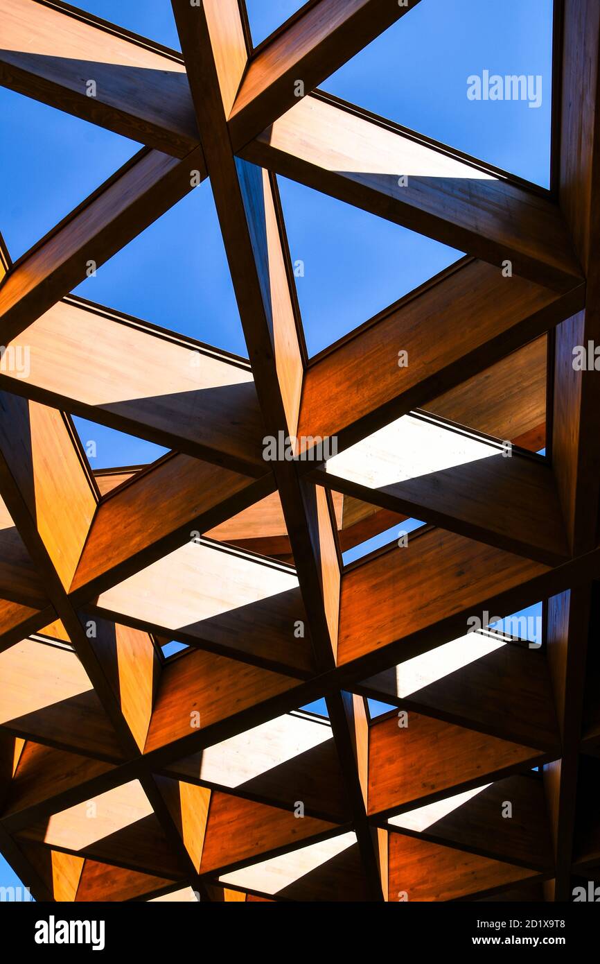 Roofing Construction. Wooden Roof Frame House Construction. Abstract Structure background. Wood texture pattern. Stock Photo