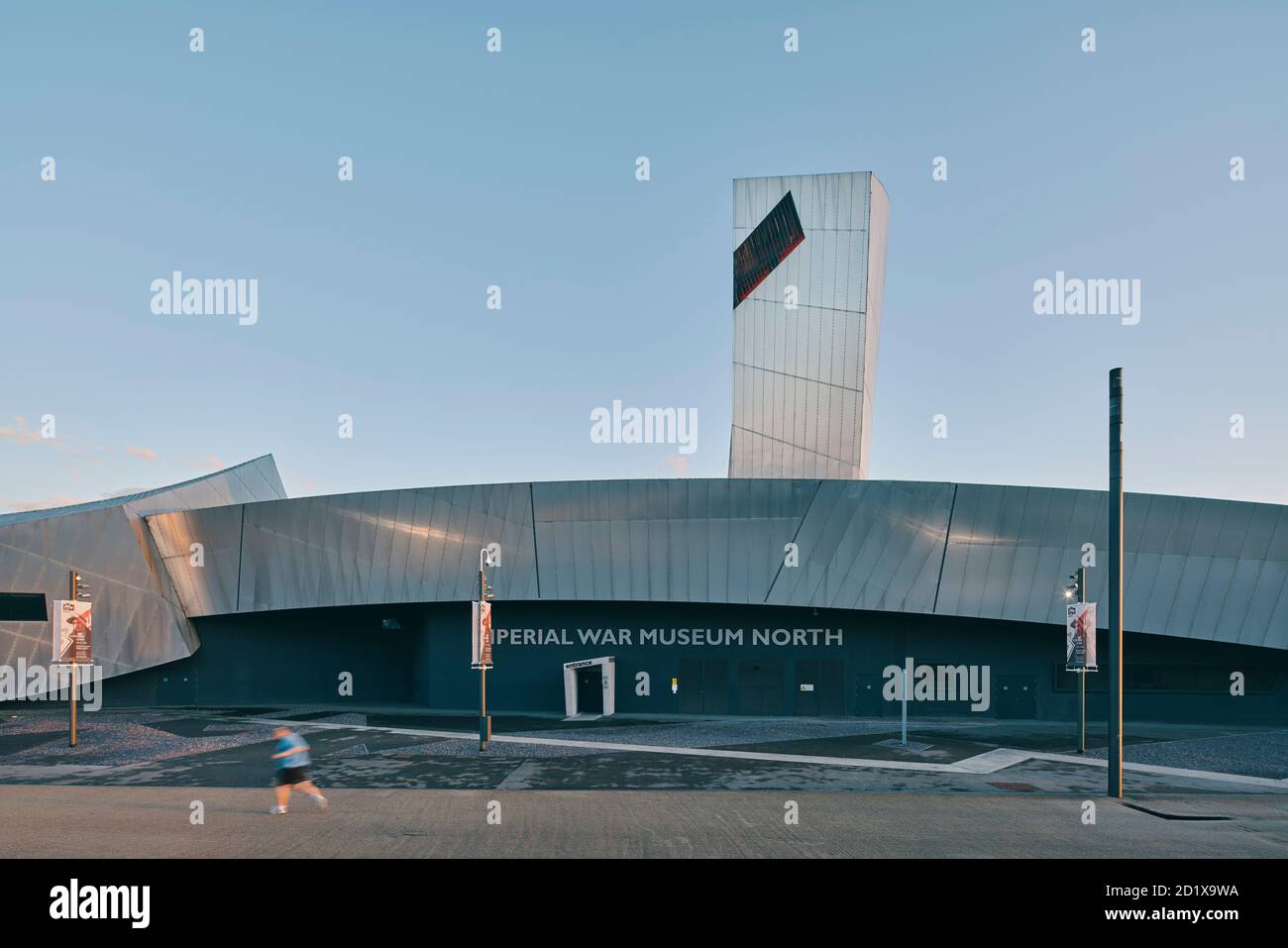 Imperial War Museum North, which represents a shattered globe, was the first building in the UK by Daniel Libeskind. Built on a bomb site, it was completed in 2002 in Salford Quays, Manchester, England, UK. Stock Photo