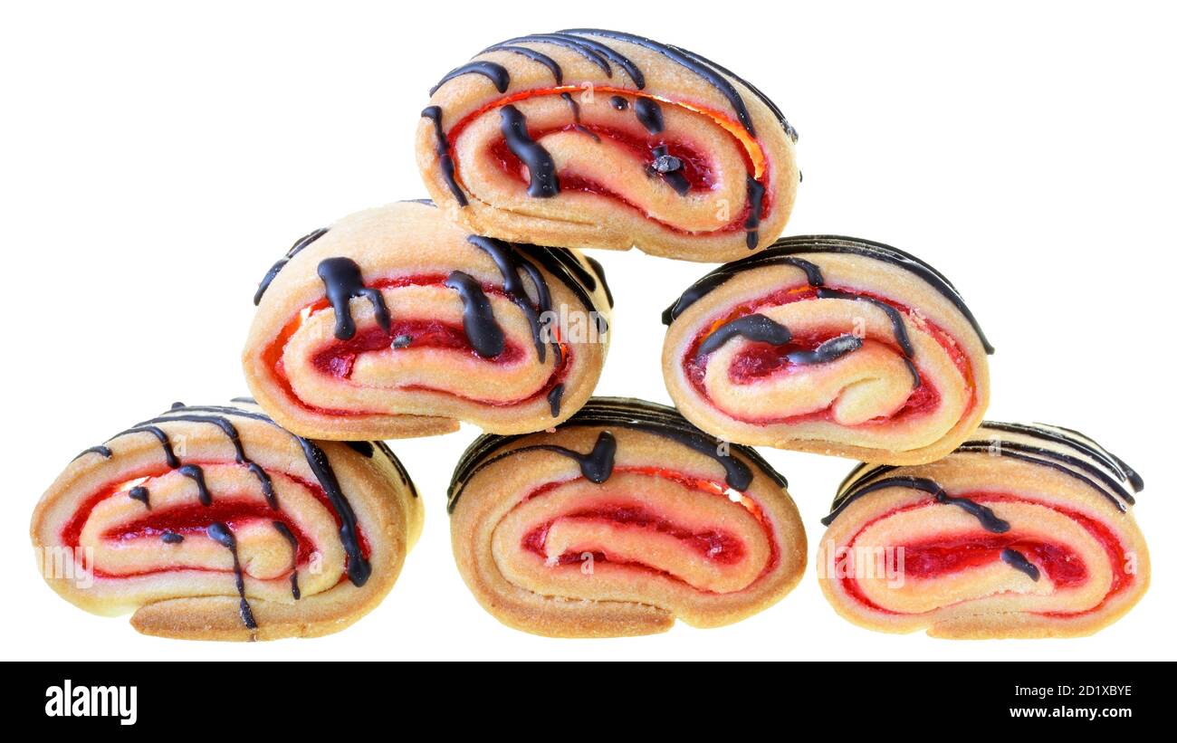 Cookies rolls with strawberry jam and chocolate icing isolated on a white background. Stock Photo