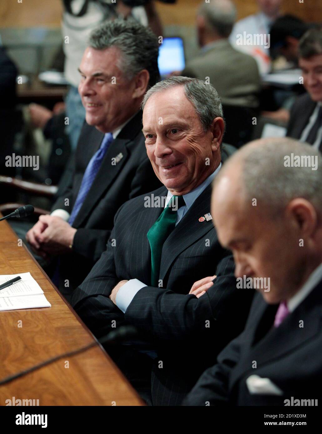 New York City Mayor Michael Bloomberg (C) shares a light moment with New York City Police Commissioner Raymond Kelly (R) and Rep. Peter King (R-NY) as they testify before the Senate Homeland Security and Governmental Affairs Committee on Capitol Hill in Washington May 5, 2010.      REUTERS/Yuri Gripas (UNITED STATES - Tags: POLITICS) Stock Photo