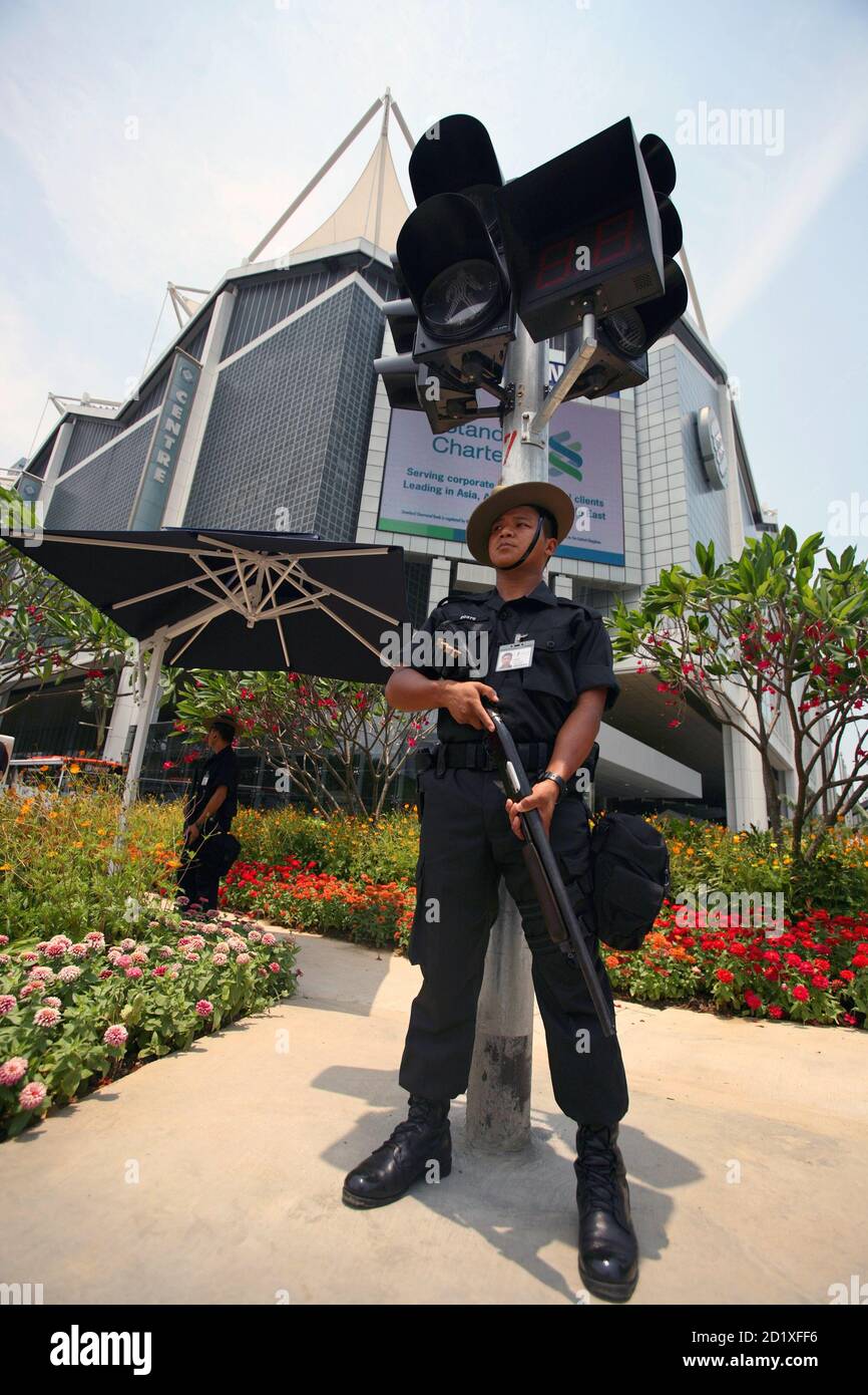 a-gurkha-stands-guard-outside-the-venue-of-the-imf-world-bank-meetings-in-singapore-september-19-2006-reutersnicky-loh-singapore-2D1XFF6.jpg