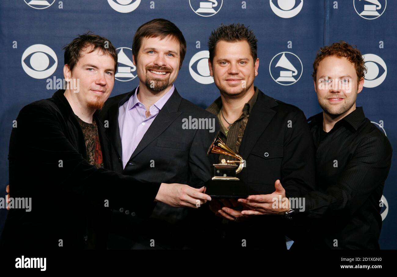 Members Of Third Day Mark Lee Mac Powell Tai Anderson And David Carr L R Hold The Award For Best Pop Contemporary Gospel Album For Wherever You Are At The 49th Annual Grammy Awards