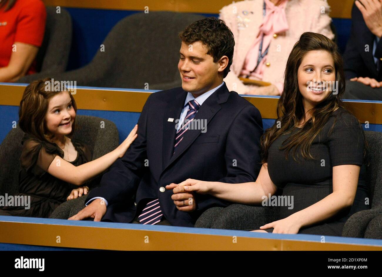 Levi Johnston (C) sits with his girlfriend Bristol Palin (R) and her sister  Piper Palin, the daughters of vice presidential candidate Gov. Sarah Palin,  at the 2008 Republican National Convention in St.