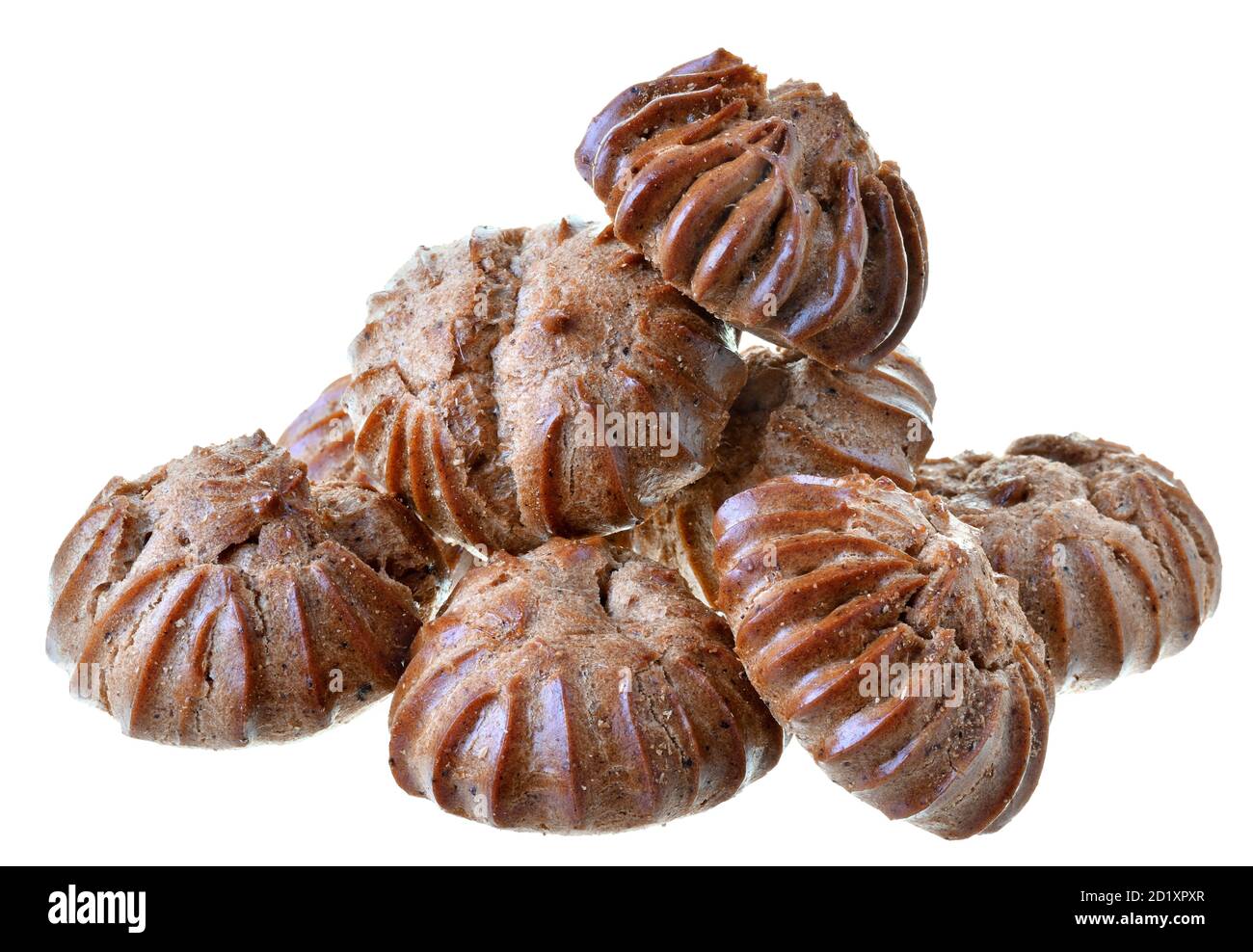 Heap of freshly baked brown eclairs isolated on a white background. Stock Photo