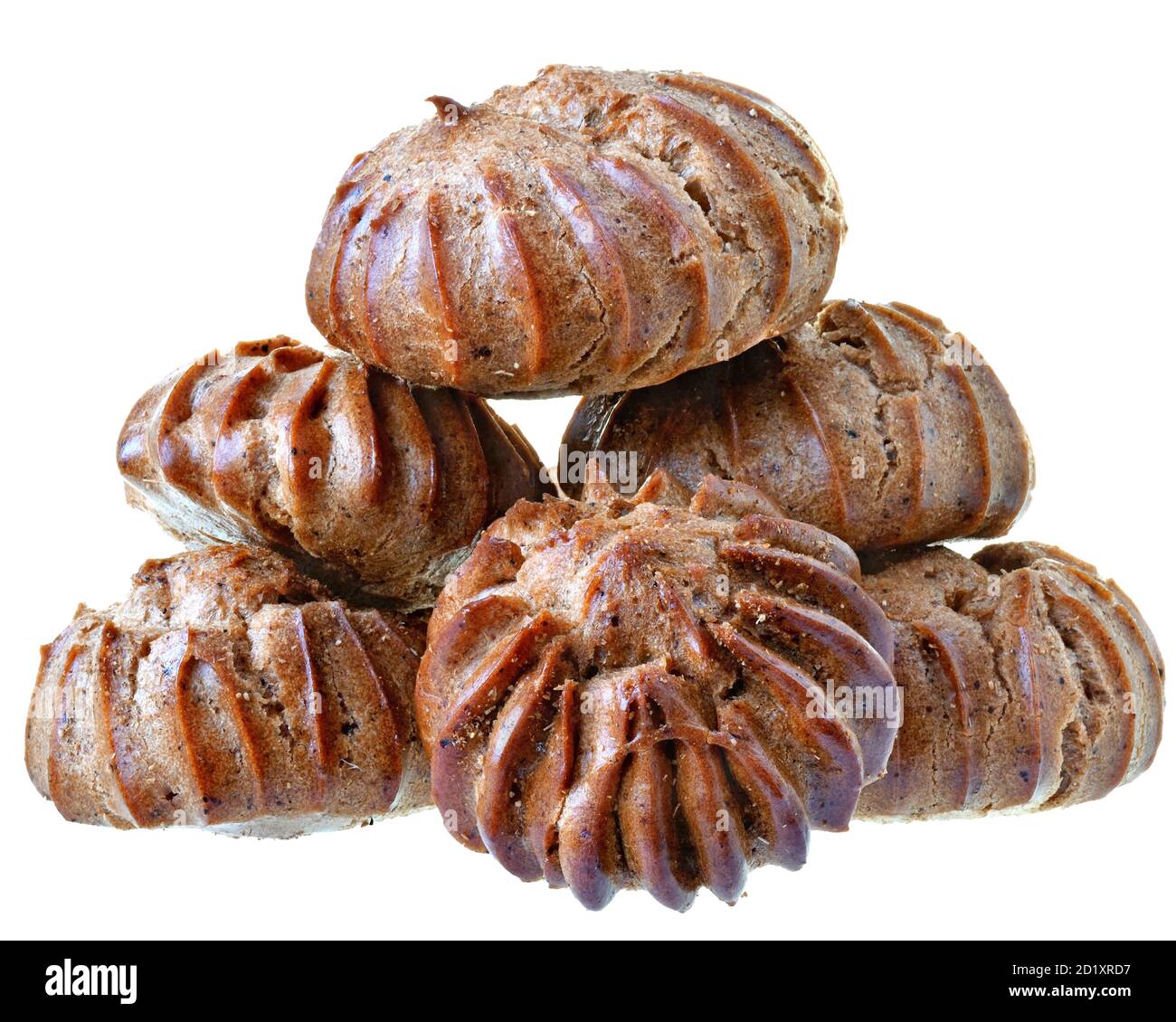 Heap of freshly baked brown eclairs isolated on a white background. Stock Photo