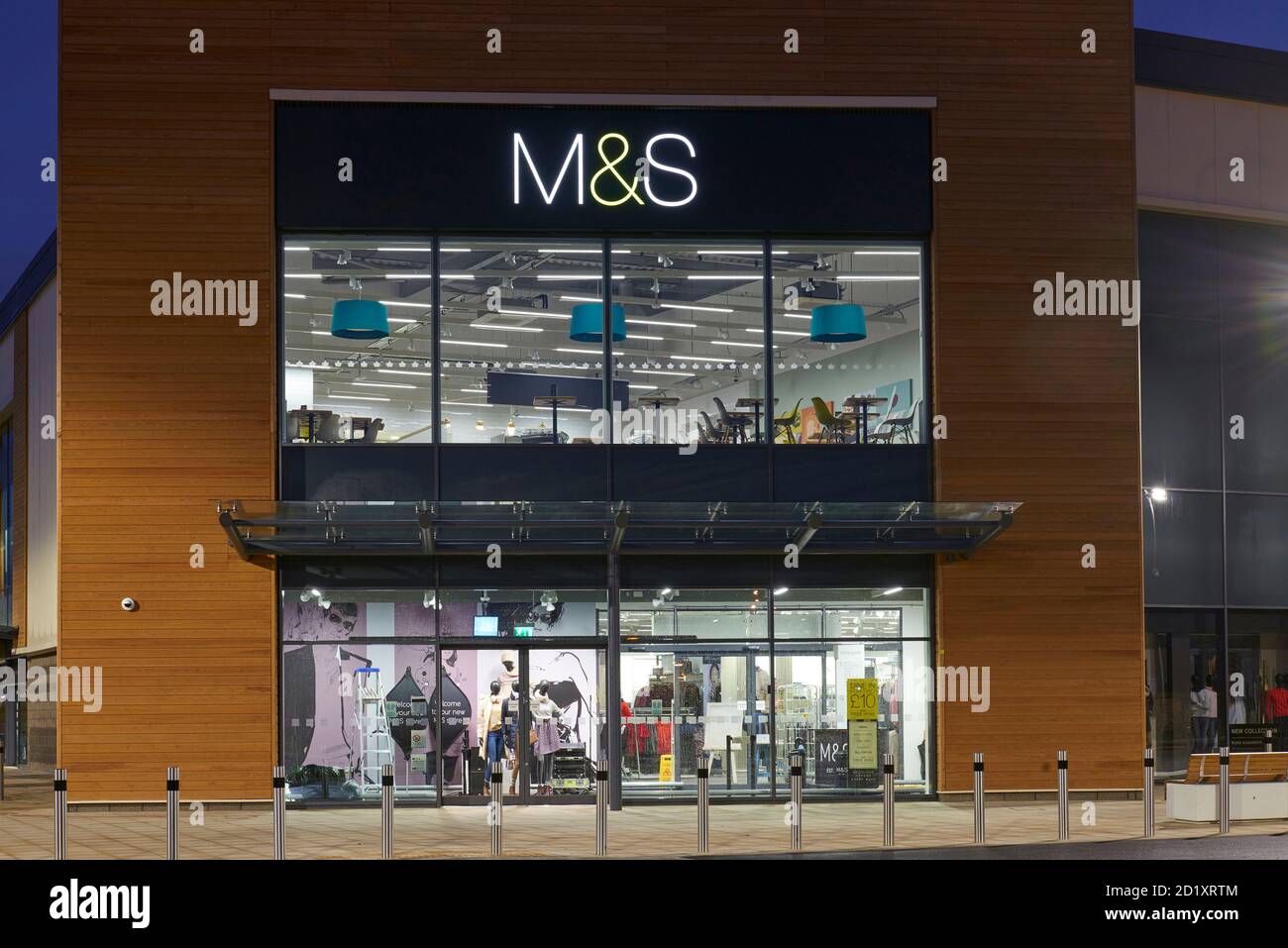 M & S frontage, lit up at night, Scunthorpe, eastern England, UK Stock Photo