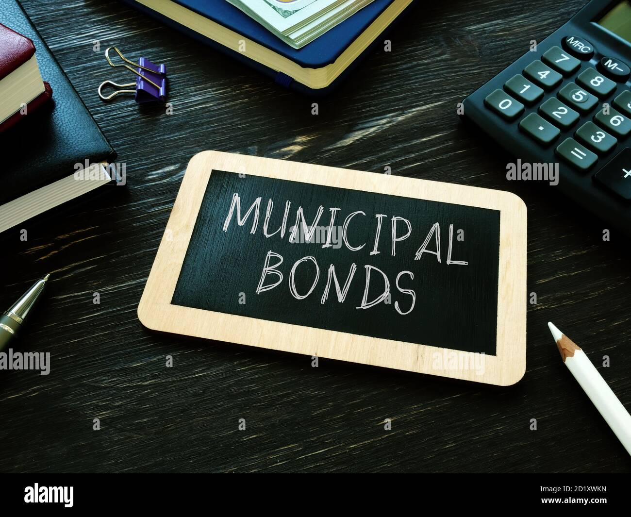 Municipal bonds written on the small blackboard. Stock Photo