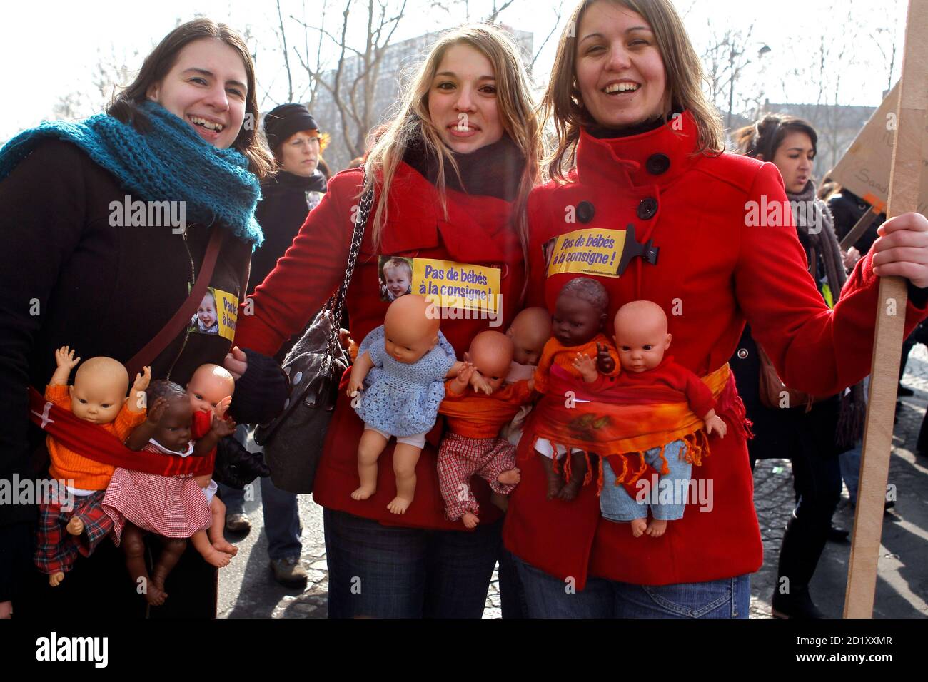 Nursery Employees Attend A Demonstration In Paris March 11 10 To Protest Against Working Conditions At Day Care Centres In France The Slogan Reads No Babies In The Left Luggage Office Reuters Charles Platiau