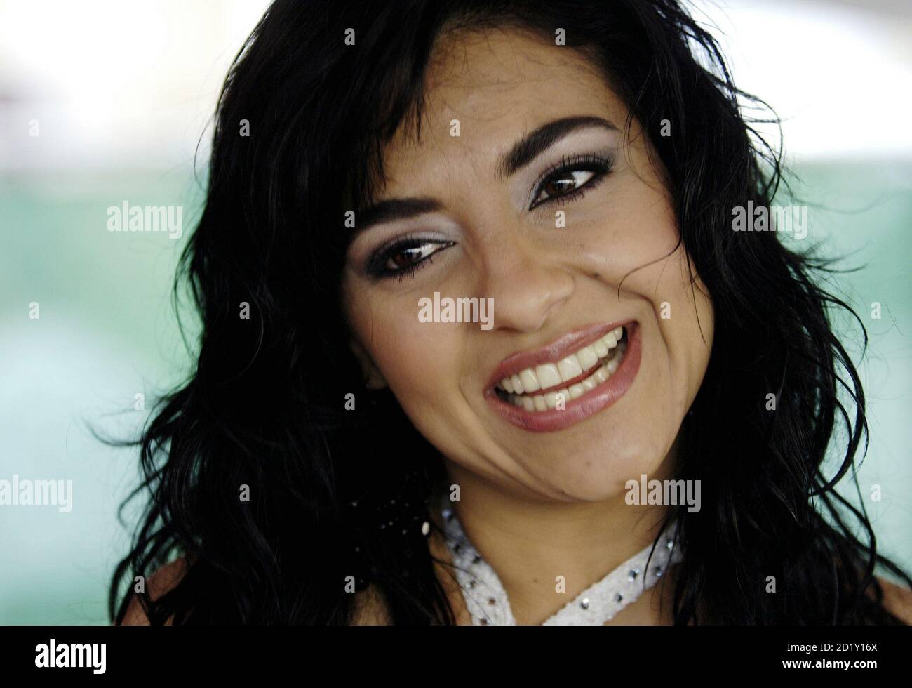 Mexican singer Graciela Beltran smiles backstage during the AT&T Fiesta Broadway in downtown Los Angeles April 30, 2006. [The Cinco de Mayo celebration featured musical entertainment, sporting activities and charitable and family activities over 36 blocks in downtown Los Angeles.] Stock Photo