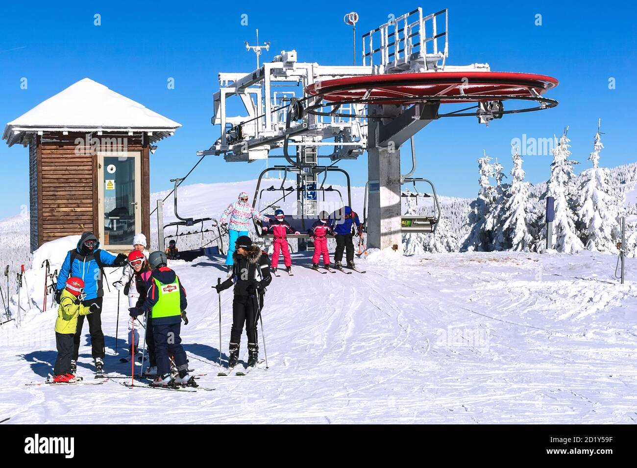 Kopaonik, Serbia - January 22, 2016: Ski resort and chair lift, slope view and skiers Stock Photo