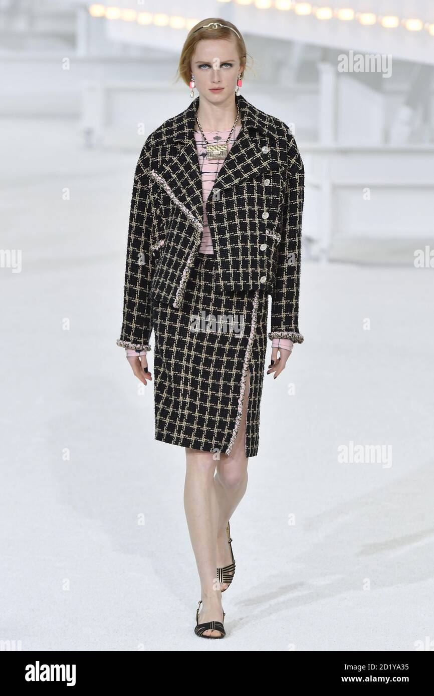 A model walks on the runway at the Chanel fashion show during the