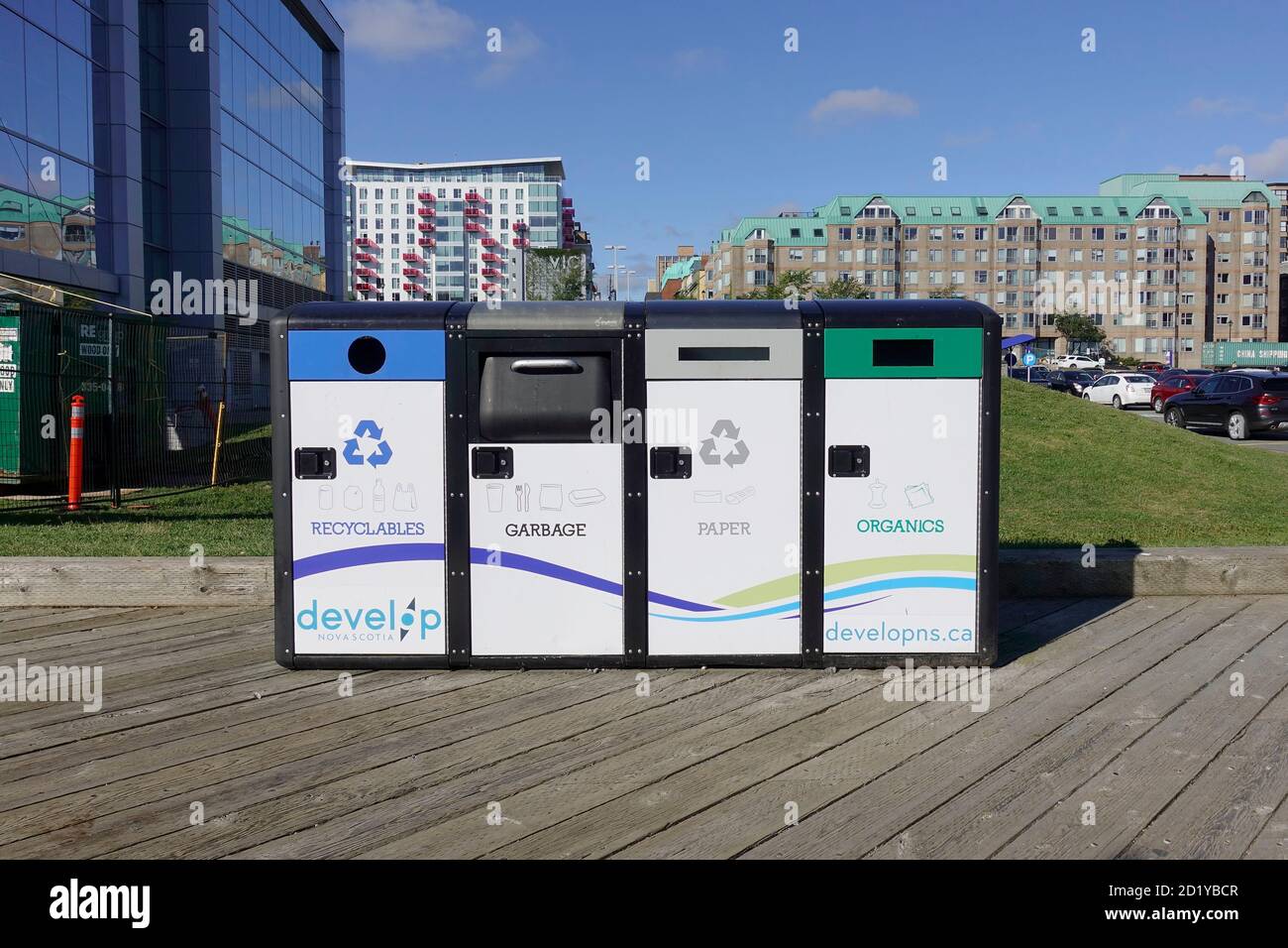 Modern Seperated Public Recycling Litter Bins For Organics Recyclables Paper And Garbage On The Boardwalk In Halifax Nova Scotia Canada Stock Photo