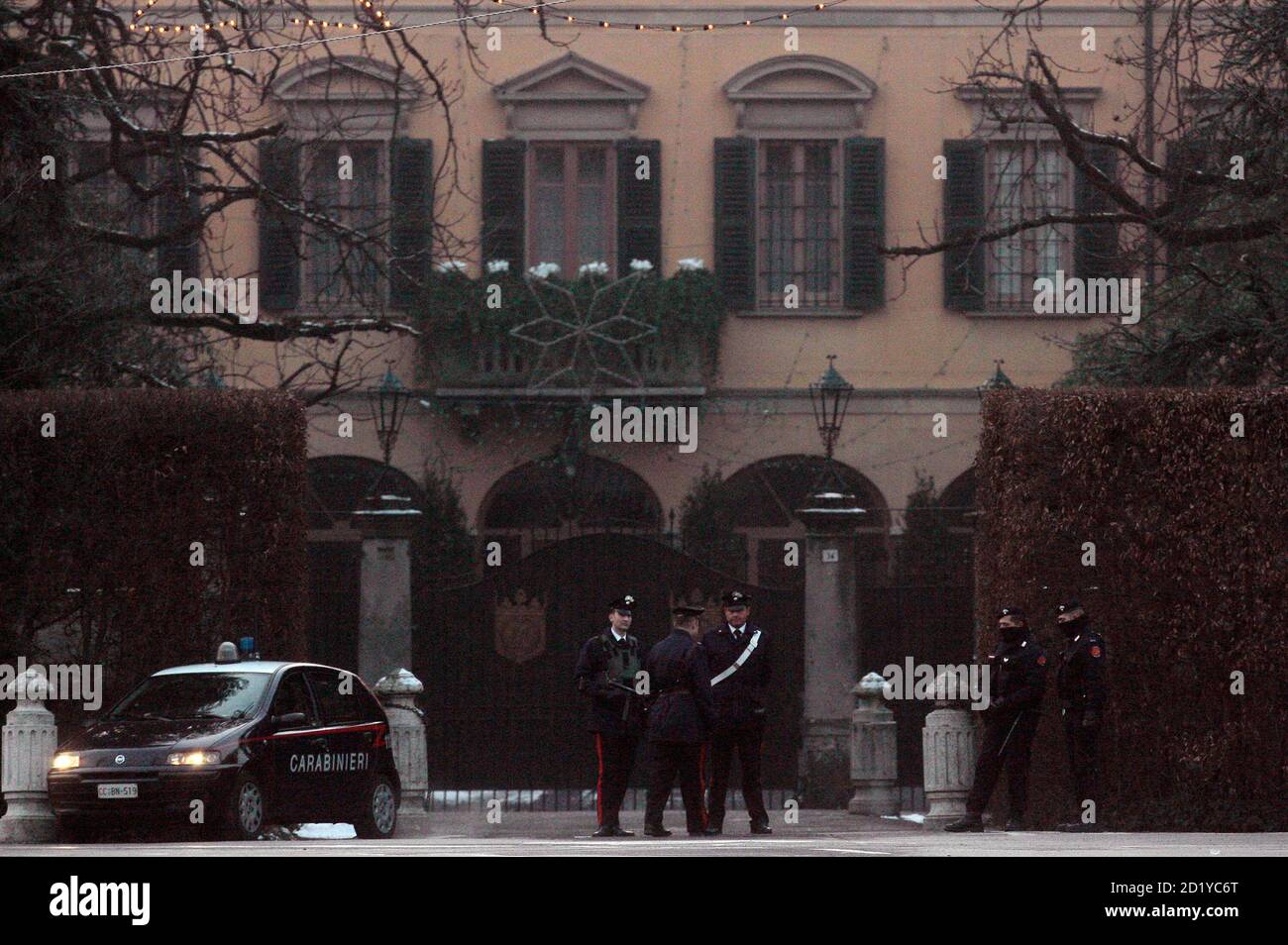 Carabinieri Police Officers Stand Outside The Villa Where Italy S Prime Minister Silvio Berlusconi Is Staying After His Arrival In Arcore Near Milan December 17 09 Berlusconi Pledged To Work With More Force Carabinieri Police Officers Stand Outside The Villa Where Italy S Prime Minister Silvio Berlusconi Is Staying After His Arrival In Arcore Near Milan December 17 09 Berlusconi Pledged To Work With More Force